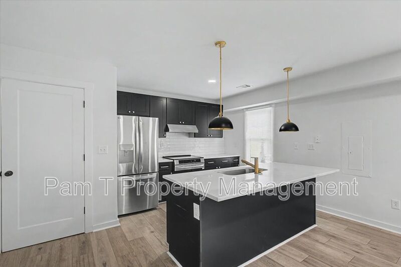 3 bedroom Carriage House in Desirable Location! Free month rent with 12 month lease property image